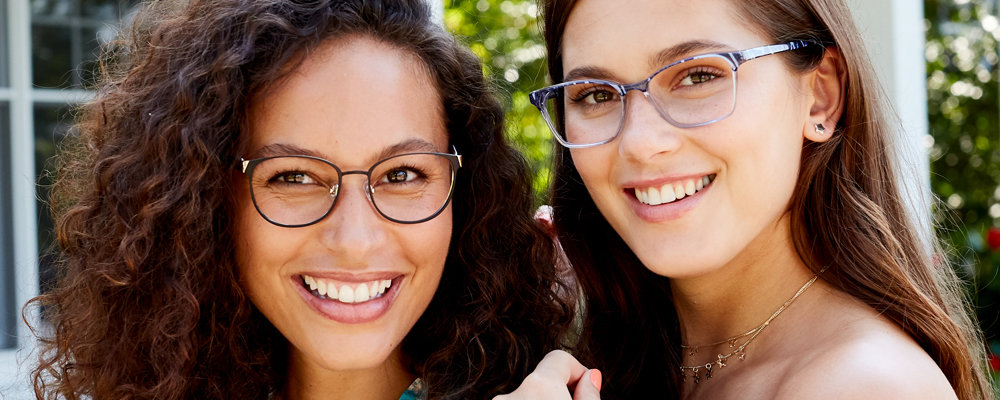 Two woman wearing Vera Bradley glasses