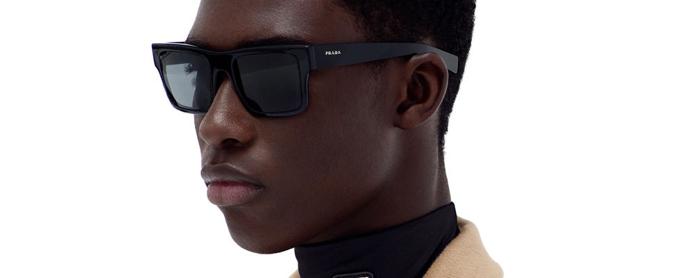 Man wearing Prada sunglasses